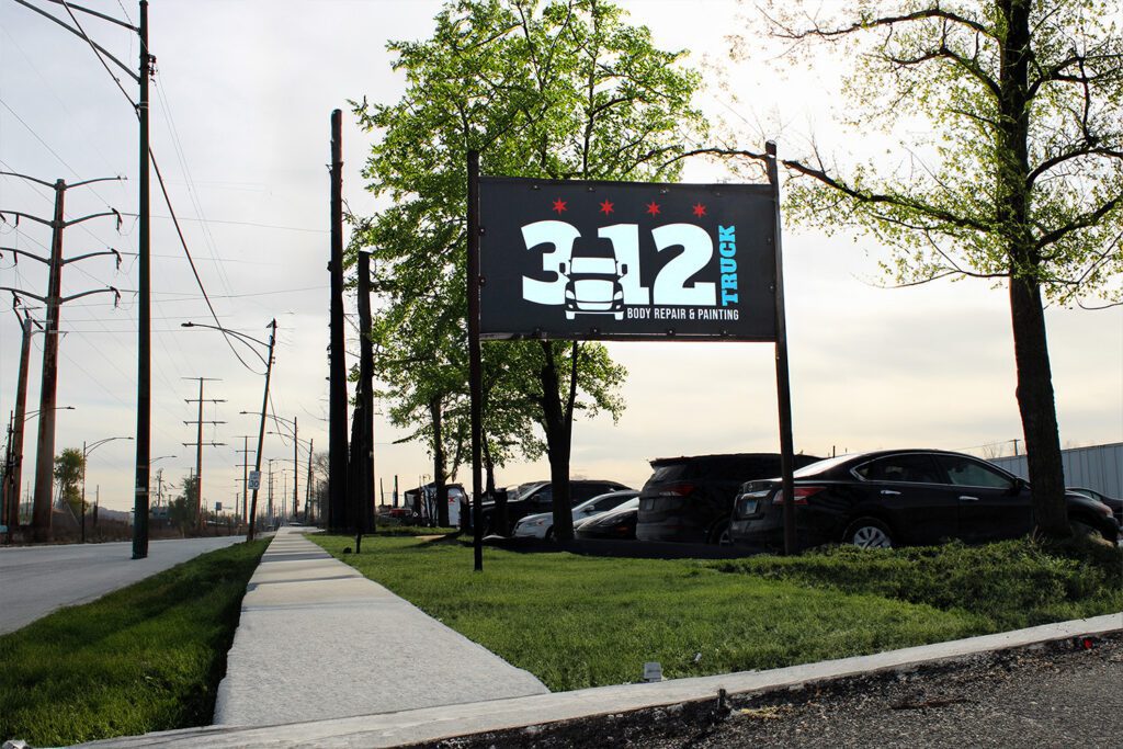 312 Truck Body Repair & Painting road sign