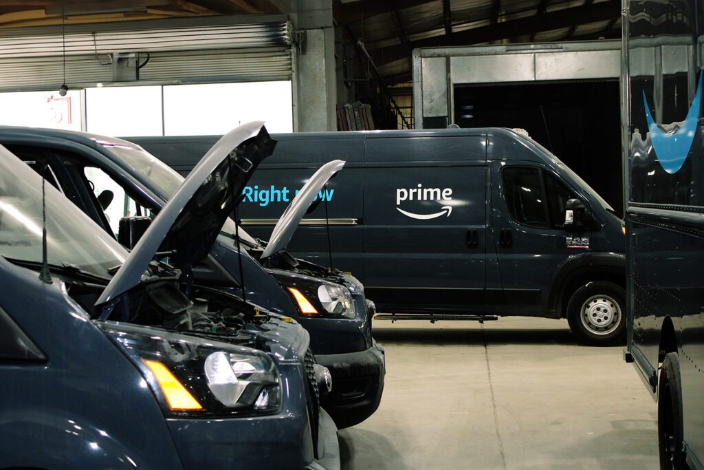 Amazon trucks in the 312 Truck Body Repair & Painting shop