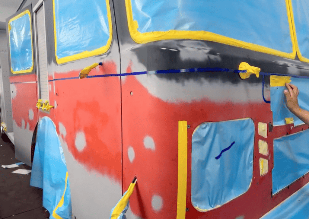 Morton Grove Fire Department Engine 5 during surface preparation for professional fire truck painting and refinishing.